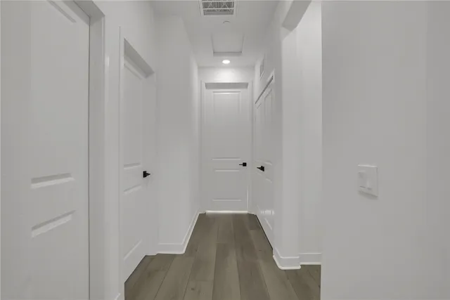 a bedroom with a bed and a table