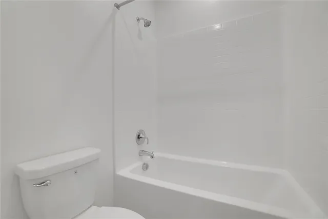 front view of a house with a garden