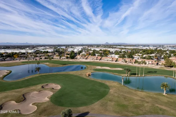 an aerial view of a house with a outdoor space