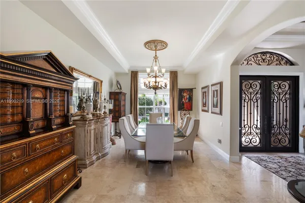 a view of a dining room with furniture window and outside view