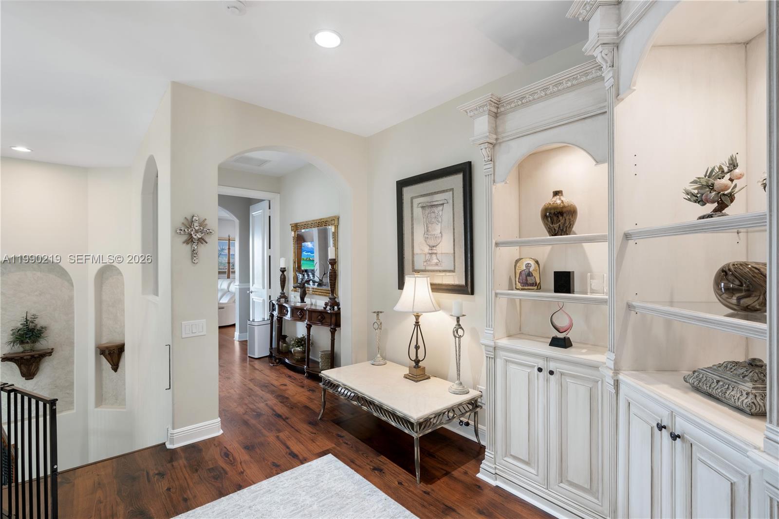 1495 Windjammer Way Hollywood, FL 33019 - Photo 22 of 48 a living room with furniture and wooden floor