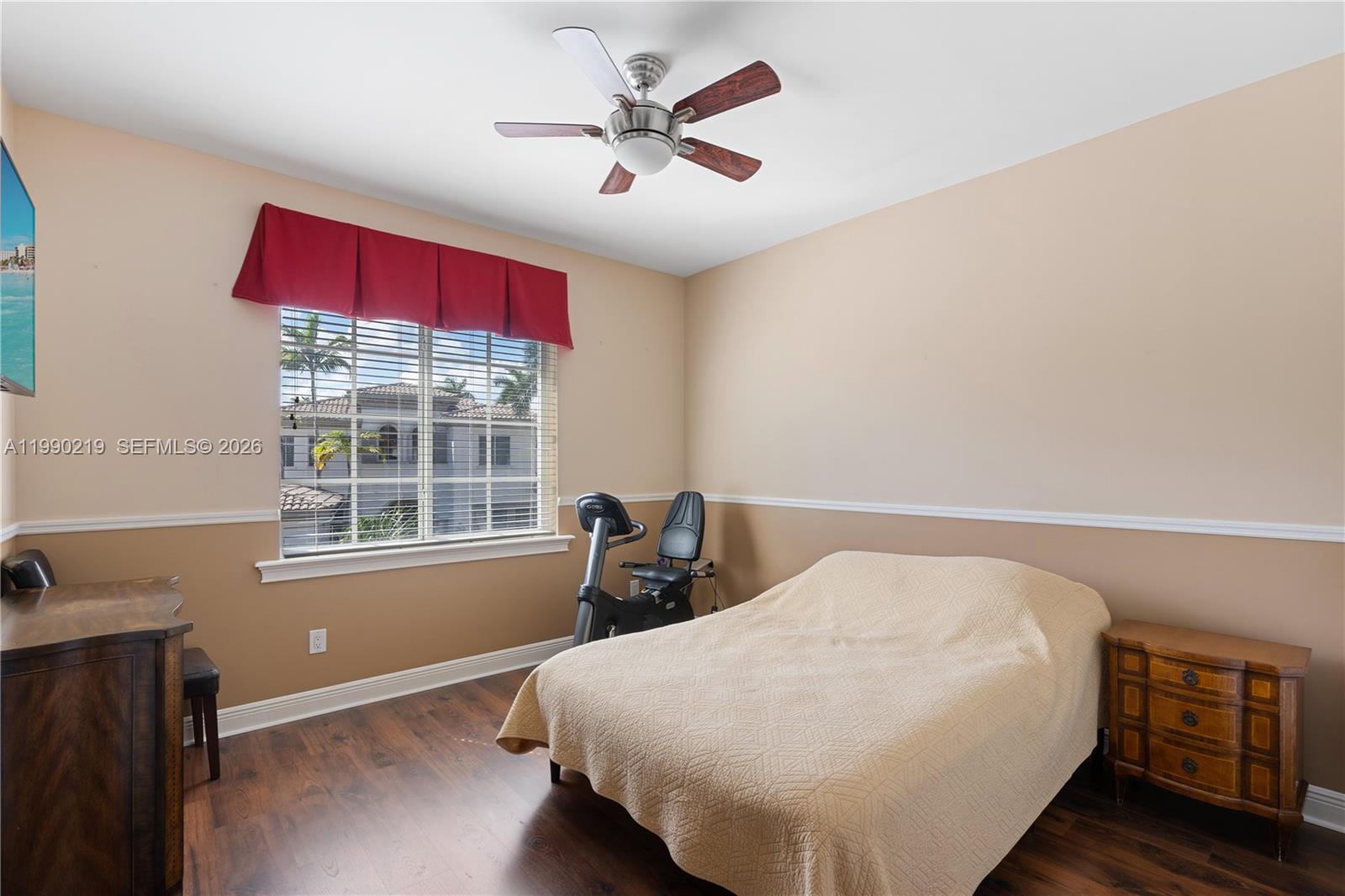 1495 Windjammer Way Hollywood, FL 33019 - Photo 31 of 48 a bedroom with bed and window