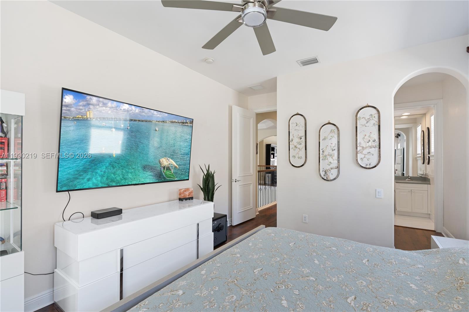 1495 Windjammer Way Hollywood, FL 33019 - Photo 35 of 48 a living room with furniture and a flat screen tv