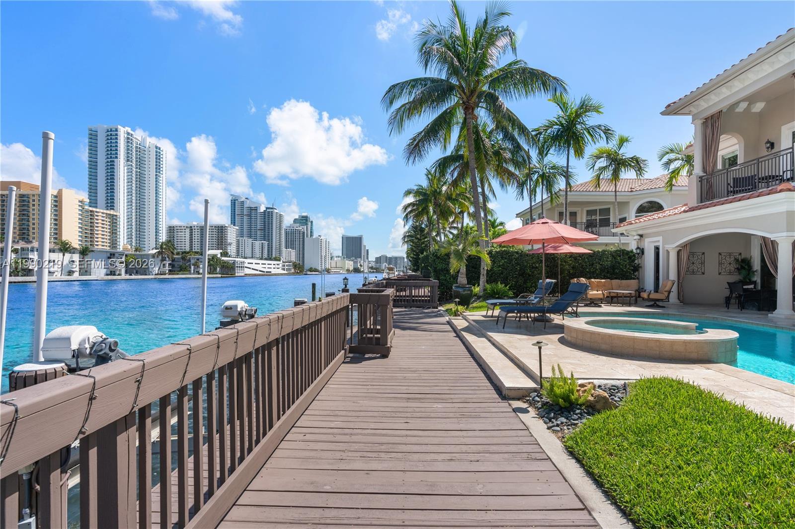 1495 Windjammer Way Hollywood, FL 33019 - Photo 39 of 48 a view of a patio with swimming pool