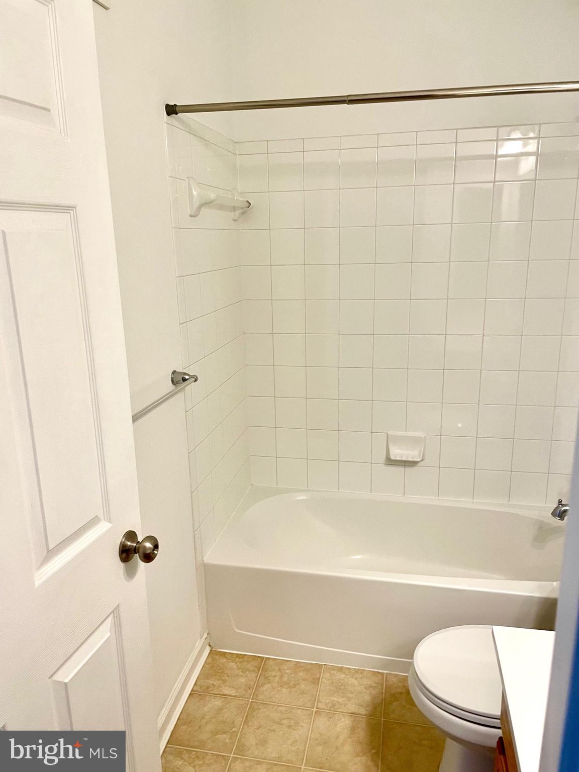 8005 Forest Ridge Drive, Unit 9 Chesapeake Beach, MD 20732 - Photo 21 of 34 Main Hallway bath shower