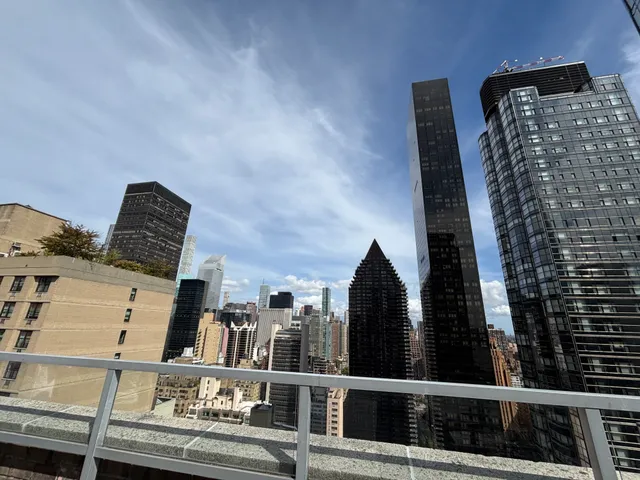 a view of a terrace with furniture