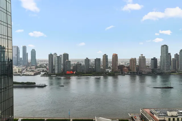 a view of barbeque area with seating