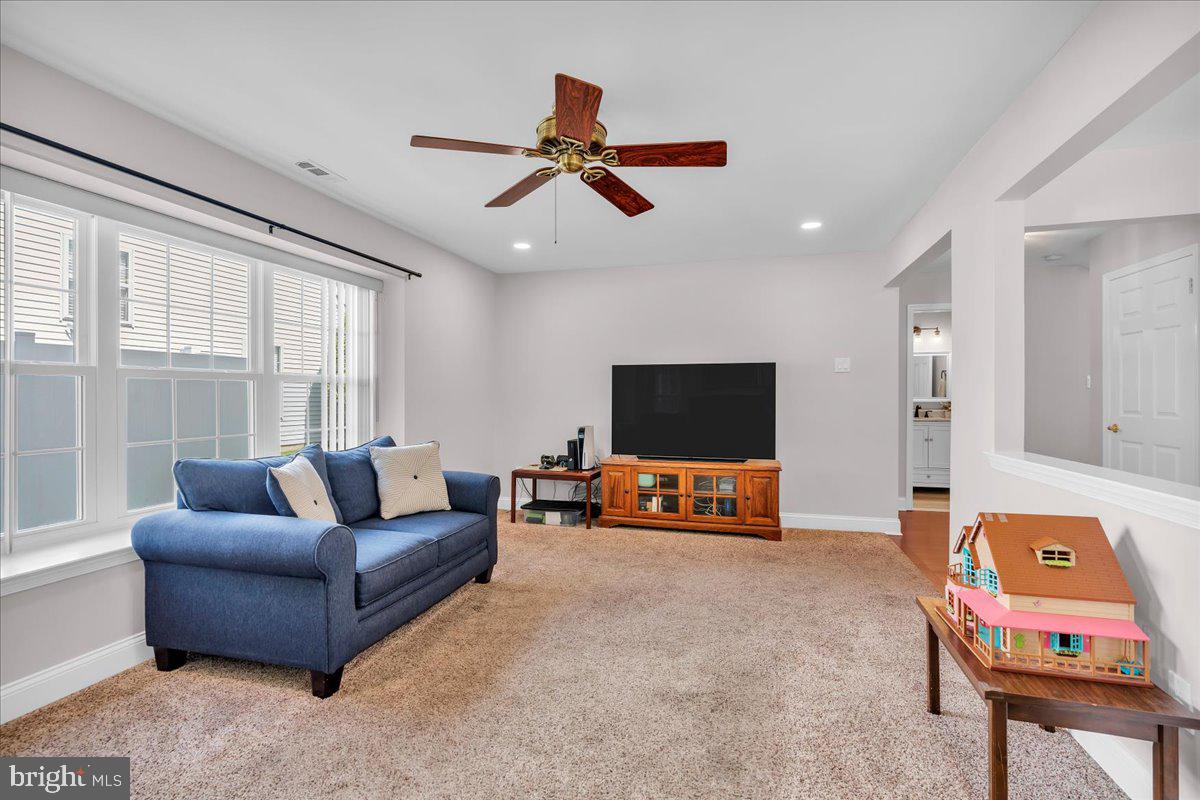 17 Vassar Road Mount Laurel, NJ 08054 - Photo 15 of 33 a living room with furniture and a flat screen tv
