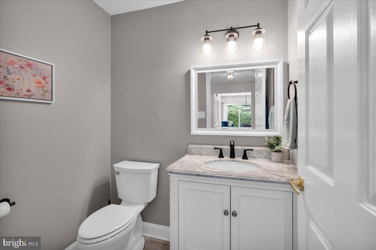 17 Vassar Road Mount Laurel, NJ 08054 - Photo 16 of 33 a bathroom with a granite countertop toilet sink and mirror