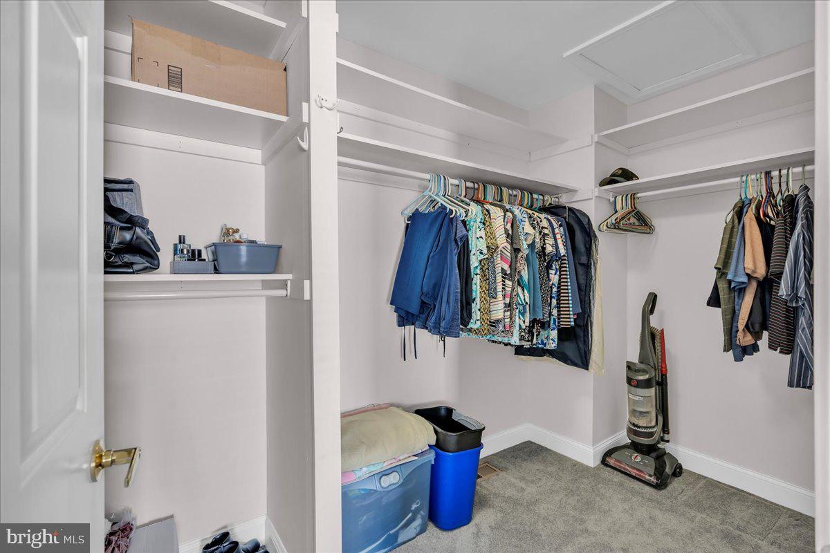 17 Vassar Road Mount Laurel, NJ 08054 - Photo 21 of 33 a view of walk in closet with clothes and shoes
