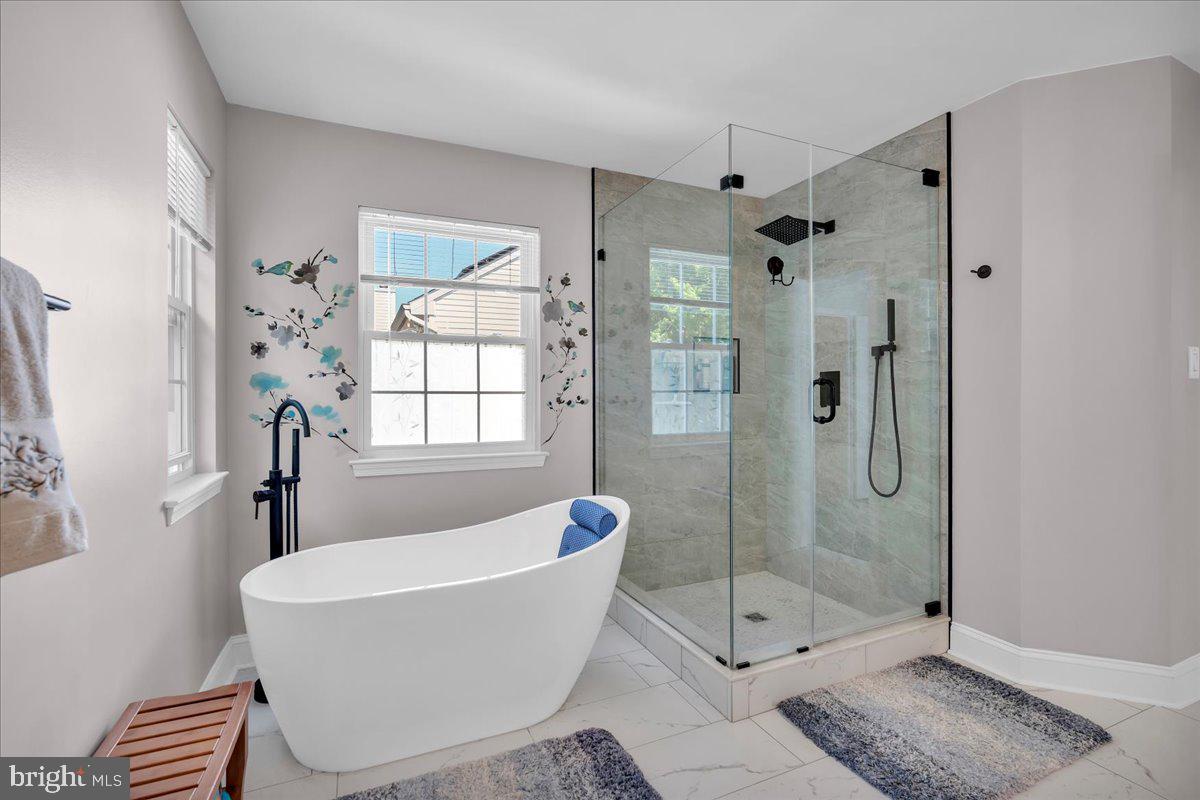 17 Vassar Road Mount Laurel, NJ 08054 - Photo 22 of 33 a bathroom with a bathtub and a shower