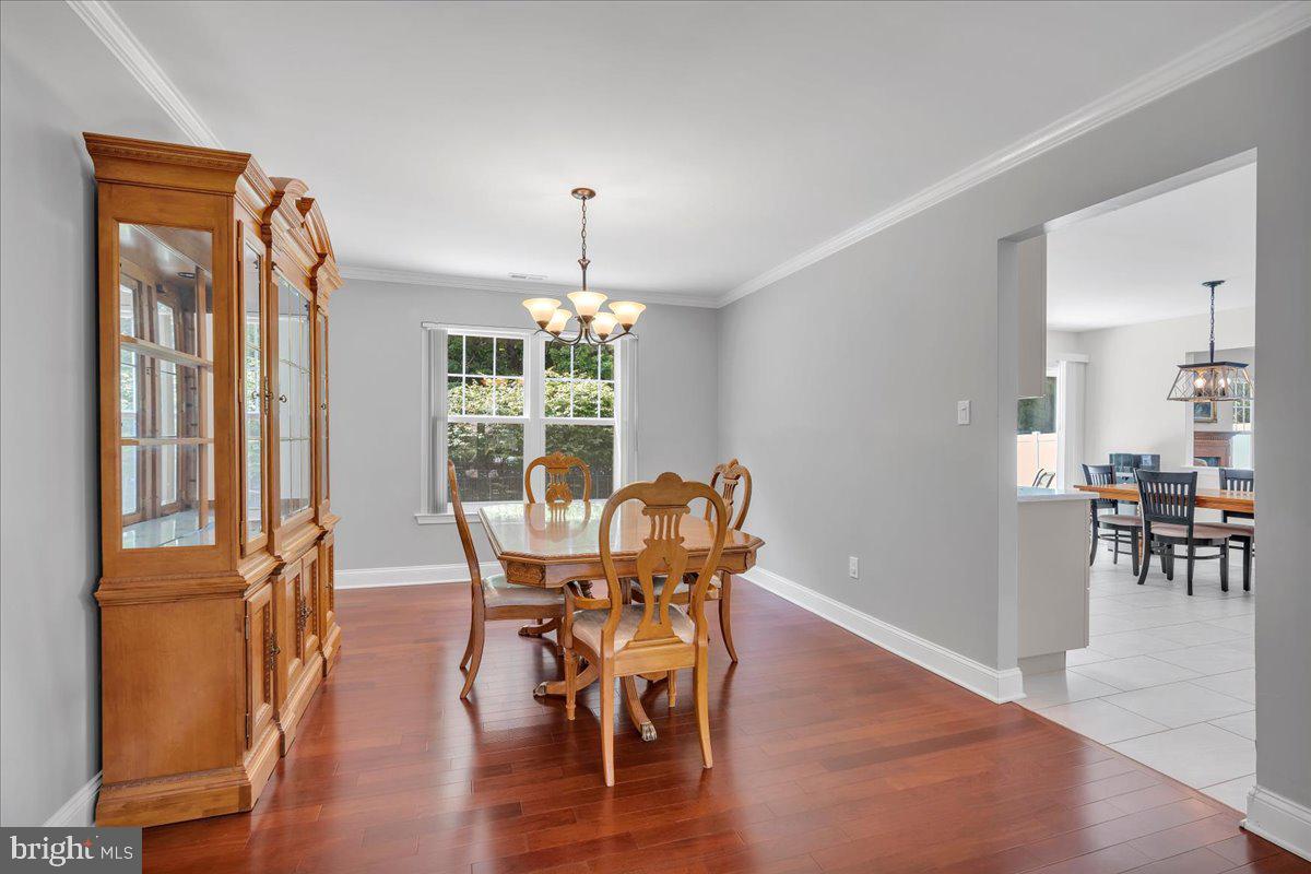 17 Vassar Road Mount Laurel, NJ 08054 - Photo 7 of 33 a view of a dining room with furniture window and wooden floor