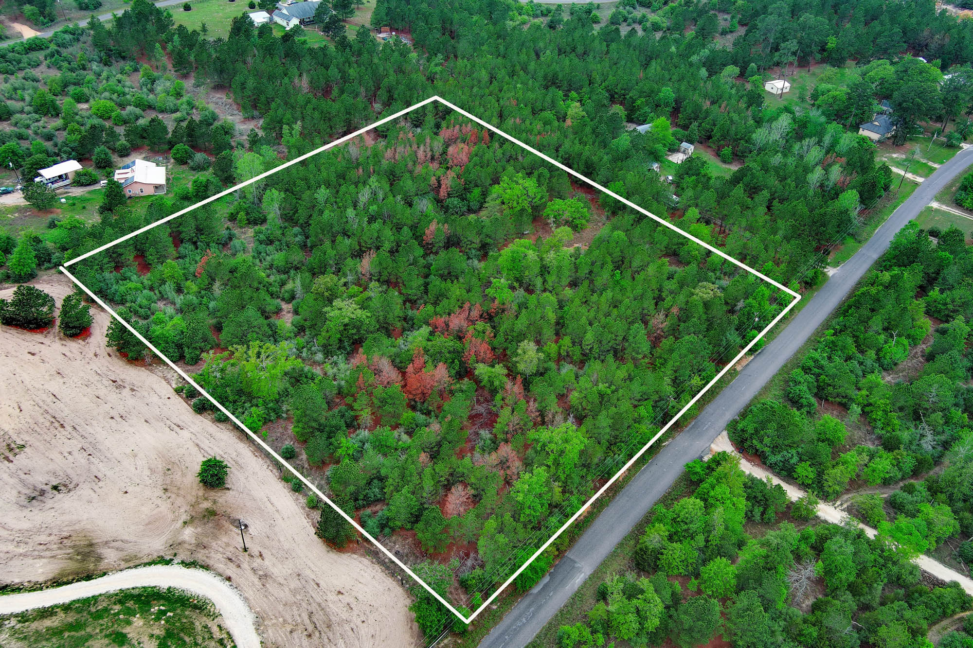 453 Kelley Road East Bastrop, TX 78602 - Photo 2 of 20 a view of a tennis court