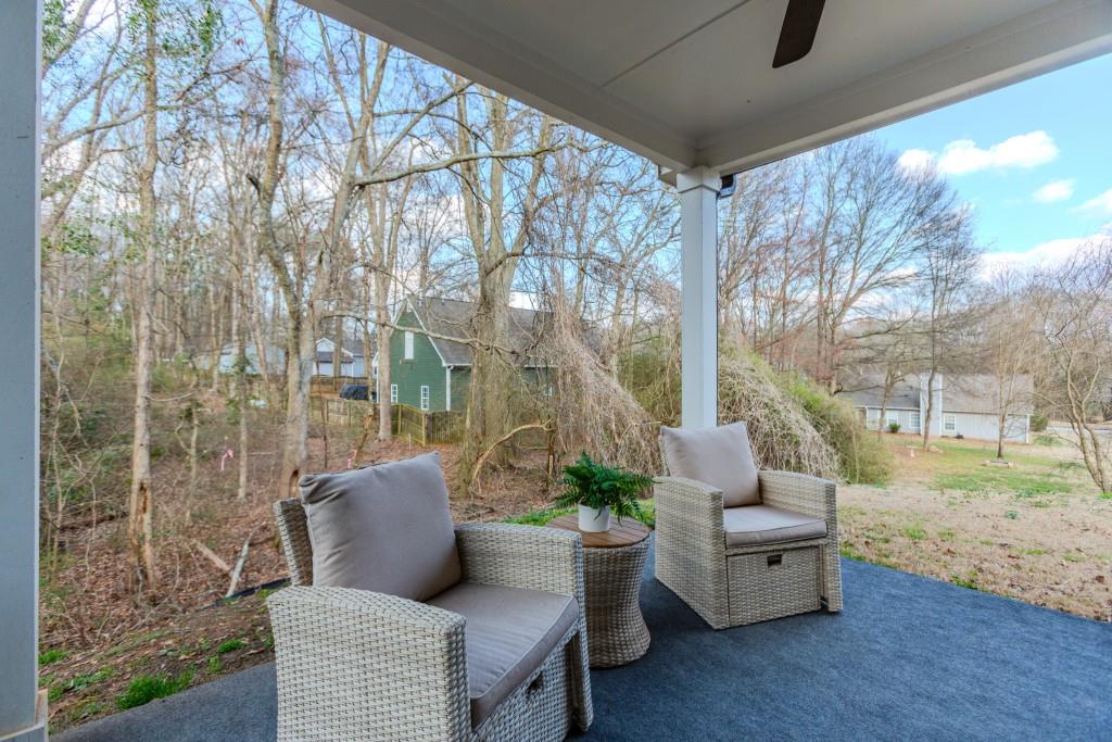 87 Cranson Walk Pendergrass, GA 30567 - Photo 44 of 50 a view of backyard with seating space