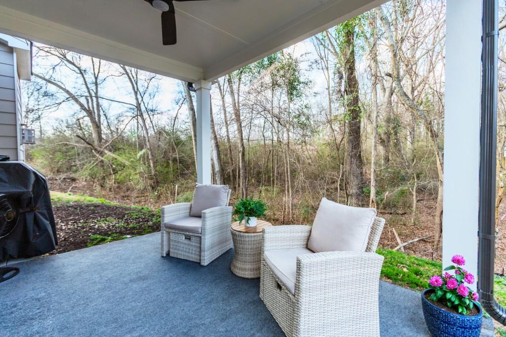 87 Cranson Walk Pendergrass, GA 30567 - Photo 45 of 50 a outdoor living space with furniture and garden view