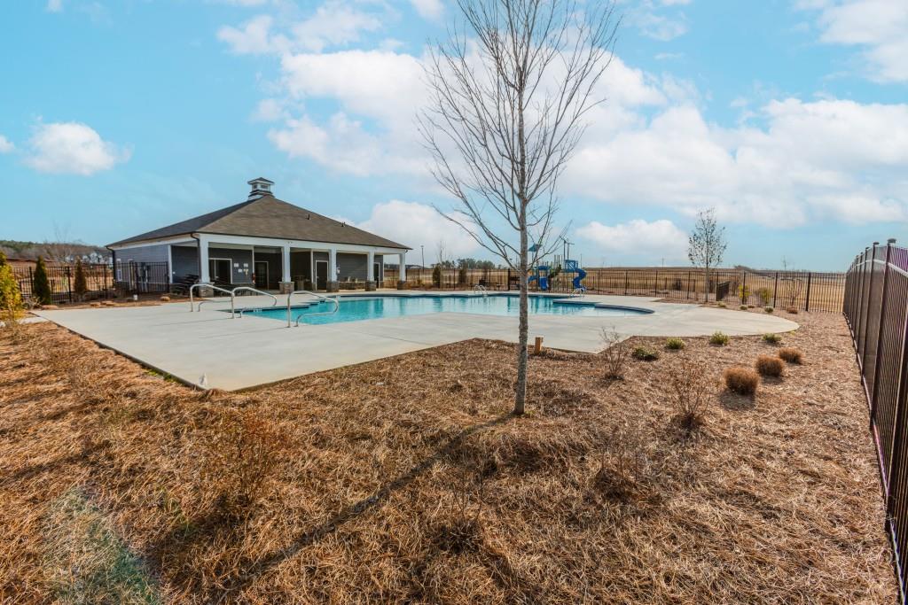 87 Cranson Walk Pendergrass, GA 30567 - Photo 50 of 50 a view of a large yard with a house