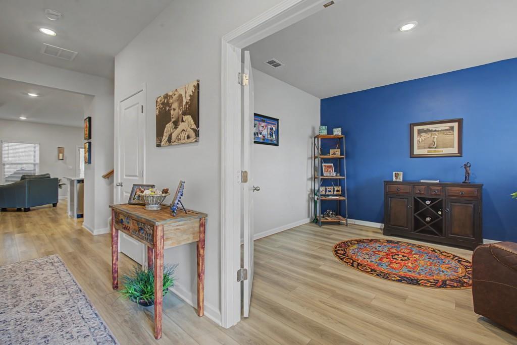87 Cranson Walk Pendergrass, GA 30567 - Photo 7 of 50 a living room with furniture and a flat screen tv