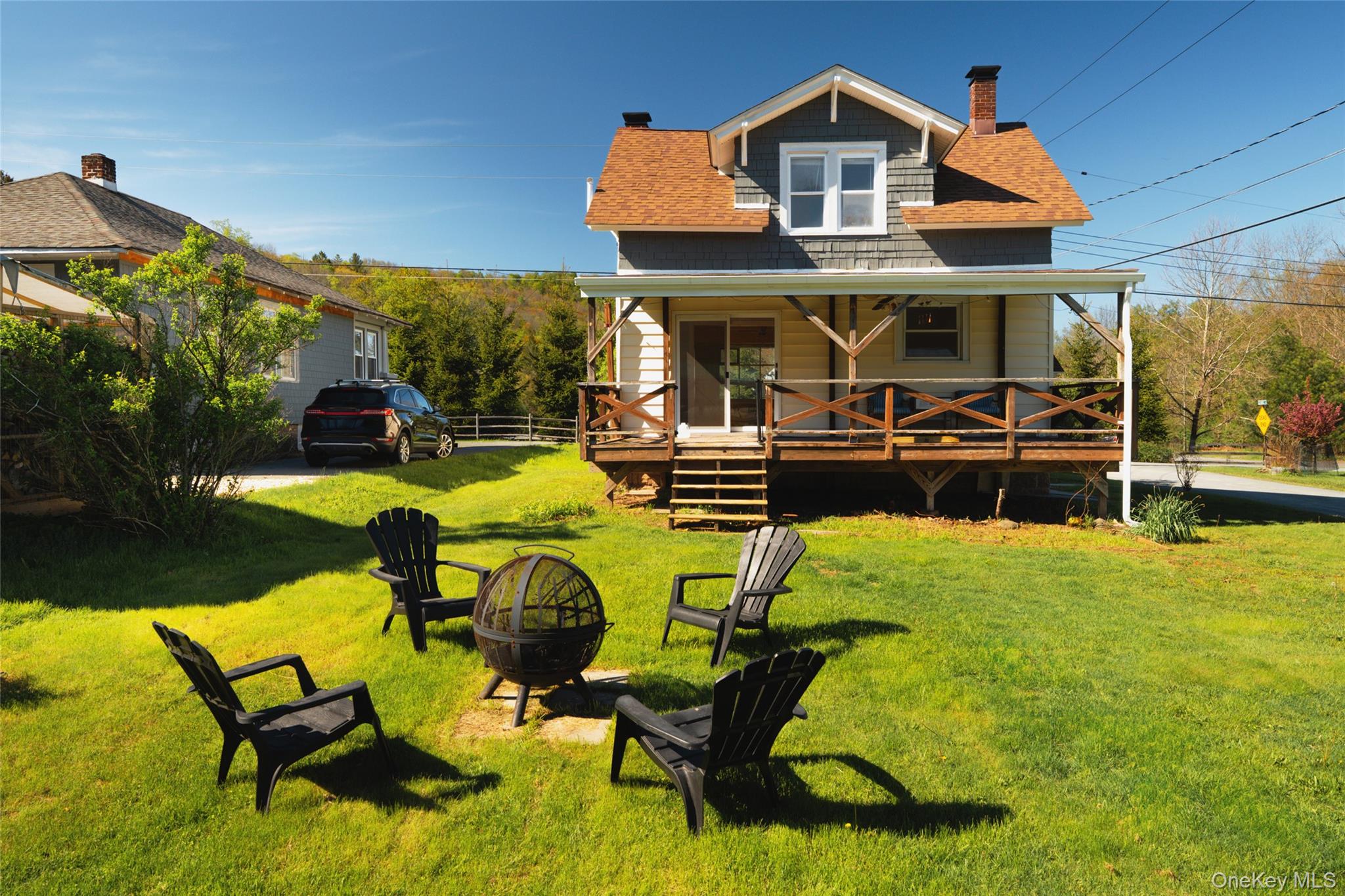 10 Fred Hessinger Road Callicoon Center, NY 12724 - Photo 26 of 28 a view of a house with pool and chairs
