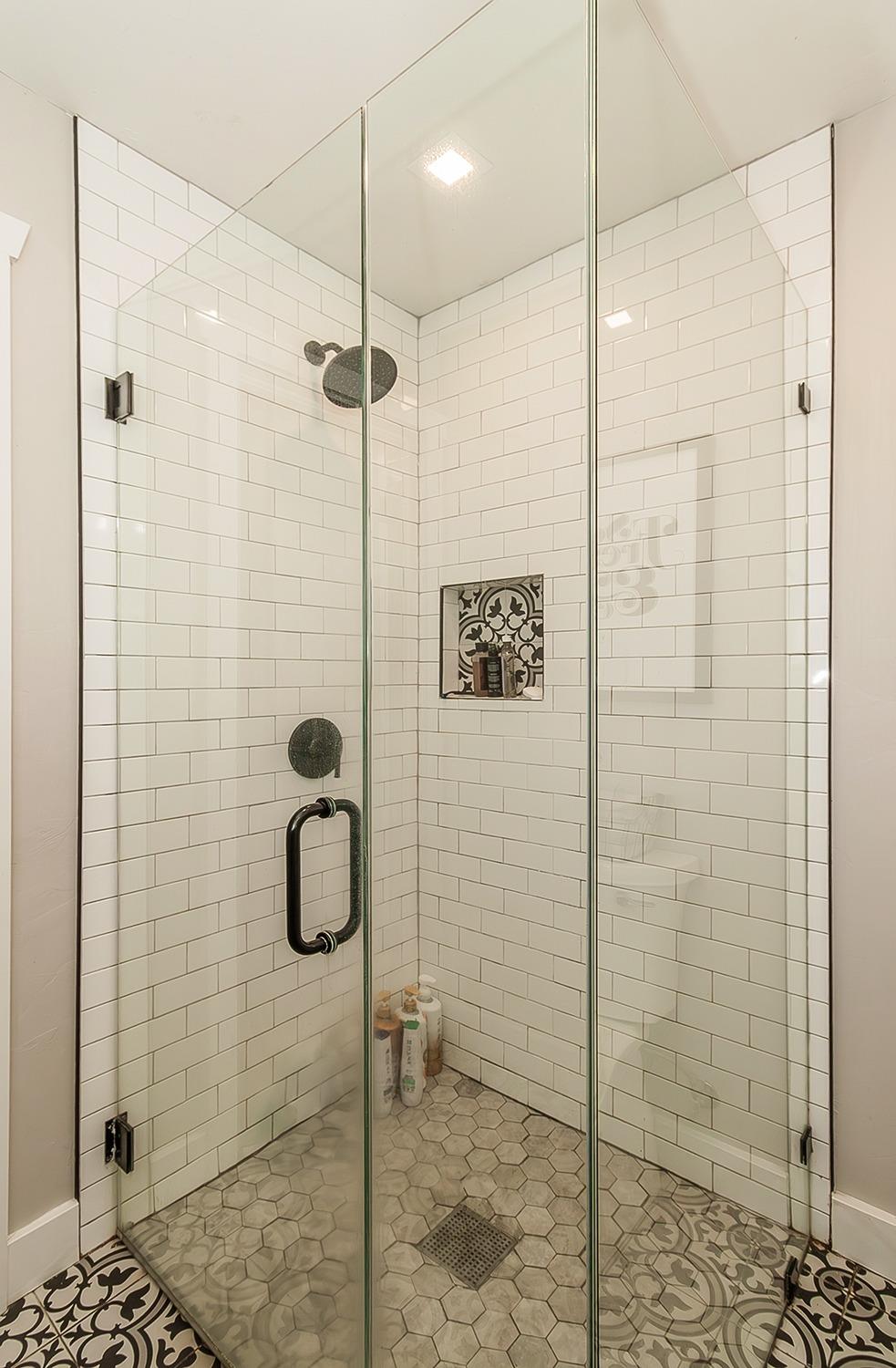 1053 K Street Reedley, CA 93654 - Photo 28 of 62 a bathroom with a shower