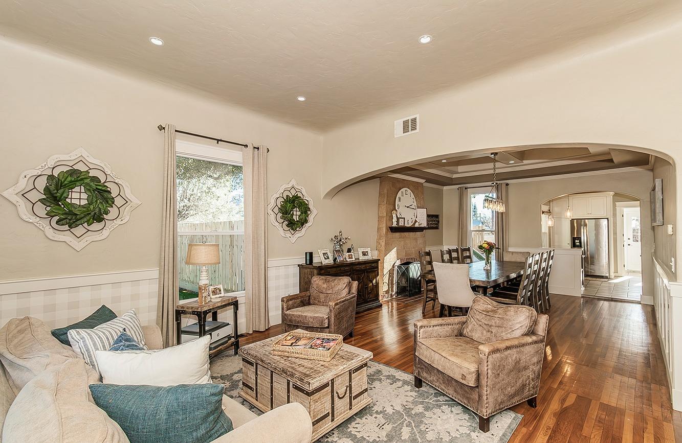 1053 K Street Reedley, CA 93654 - Photo 4 of 62 a living room with furniture and a large window