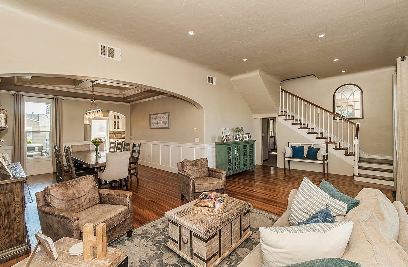 1053 K Street Reedley, CA 93654 - Photo 7 of 62 a living room with furniture and wooden floor