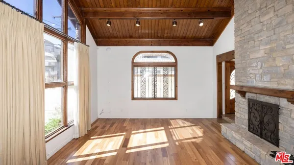 a kitchen with stainless steel appliances granite countertop a stove and a cabinets