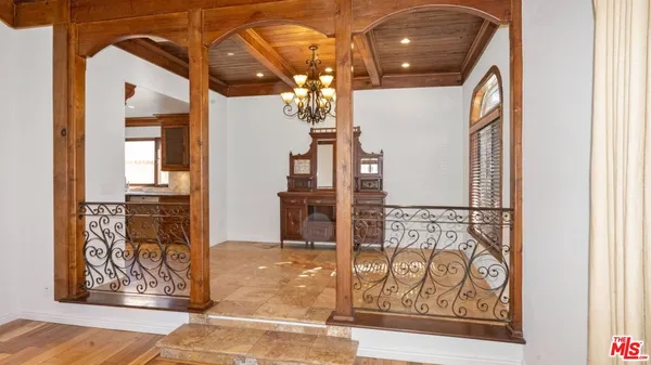 a kitchen with granite countertop a sink and a stove