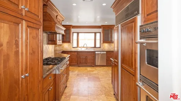 a close view of a utility room with washer and dryer