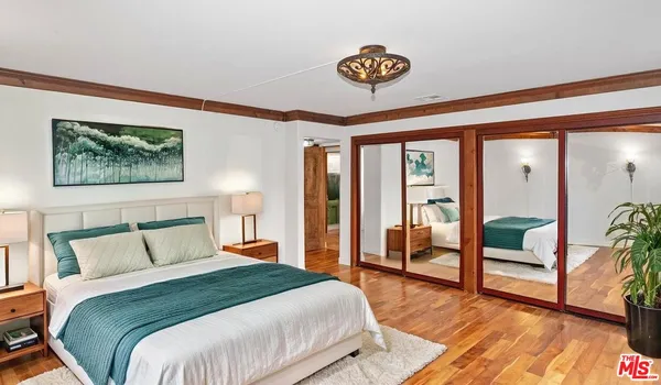 a view of hallway with furniture and a entryway