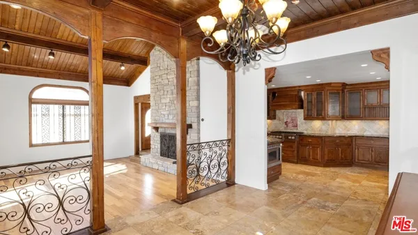 a view of an empty room with windows