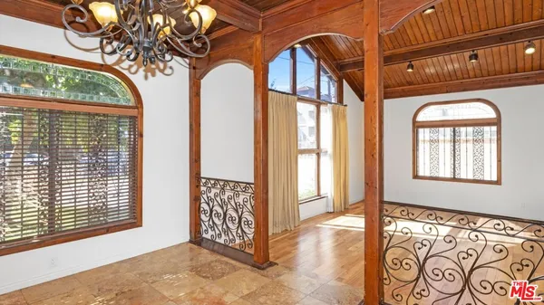 a kitchen with stainless steel appliances granite countertop a stove top oven a sink and dishwasher