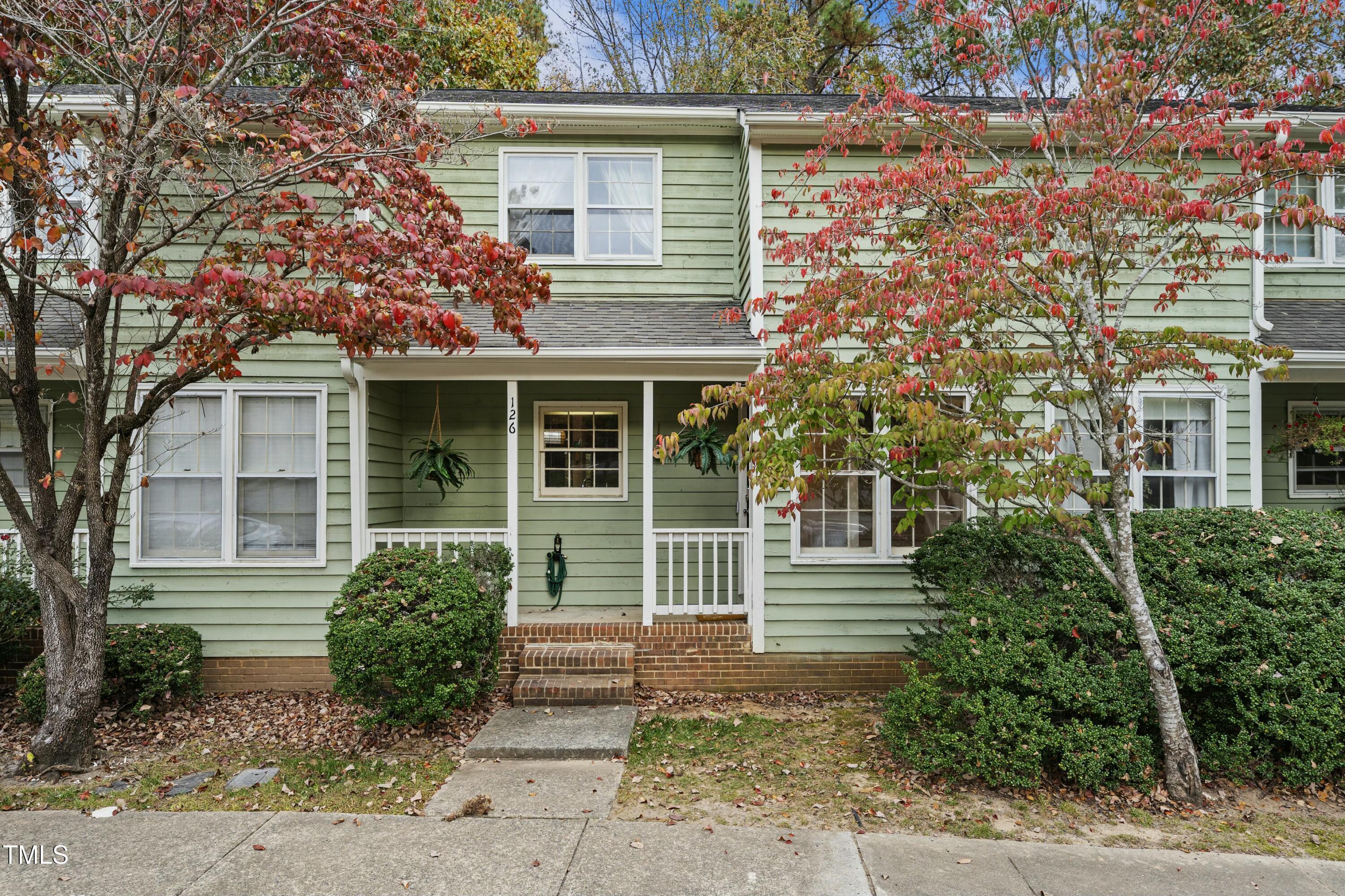 126 Shady Spring Place Durham, NC 27713 - Photo 1 of 14 a house view with a garden space