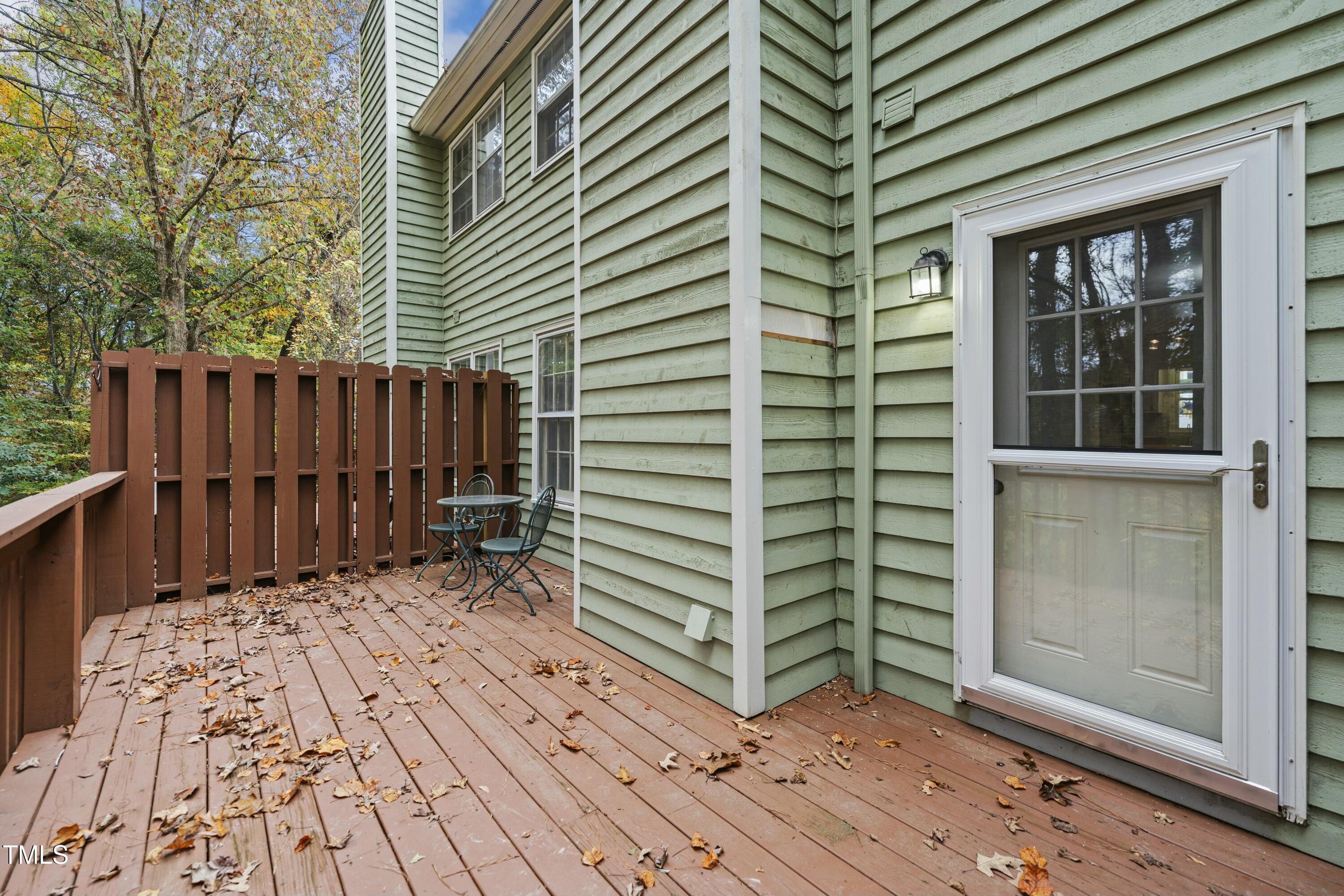 126 Shady Spring Place Durham, NC 27713 - Photo 12 of 14 a view of a house with a wooden fence