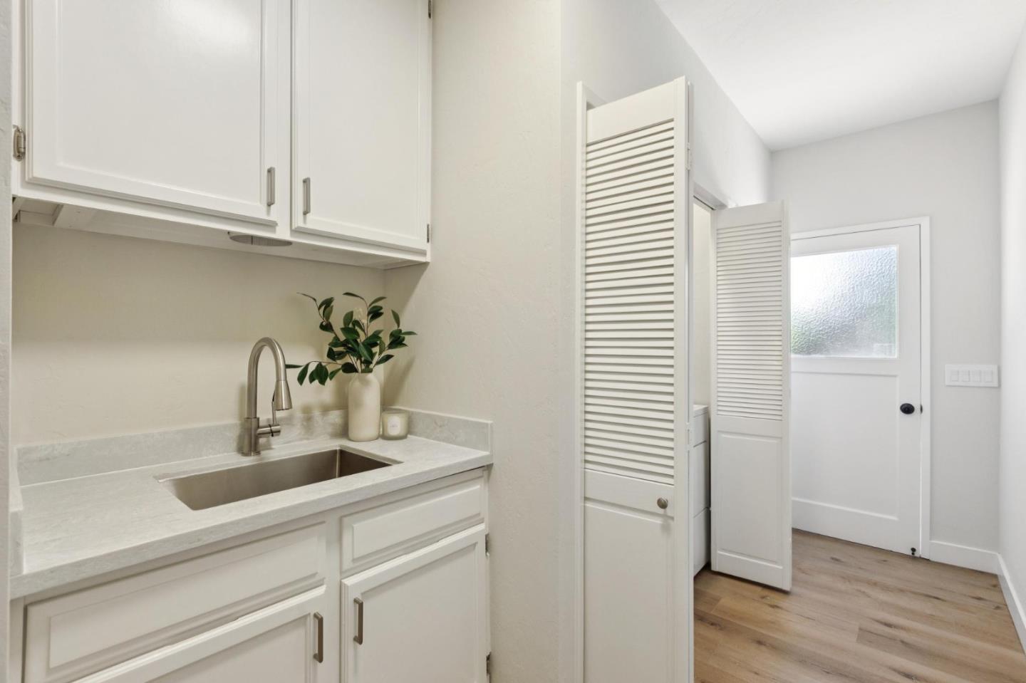 755 Santa Rita Avenue Los Altos, CA 94022 - Photo 26 of 50 a bathroom with a sink and a mirror