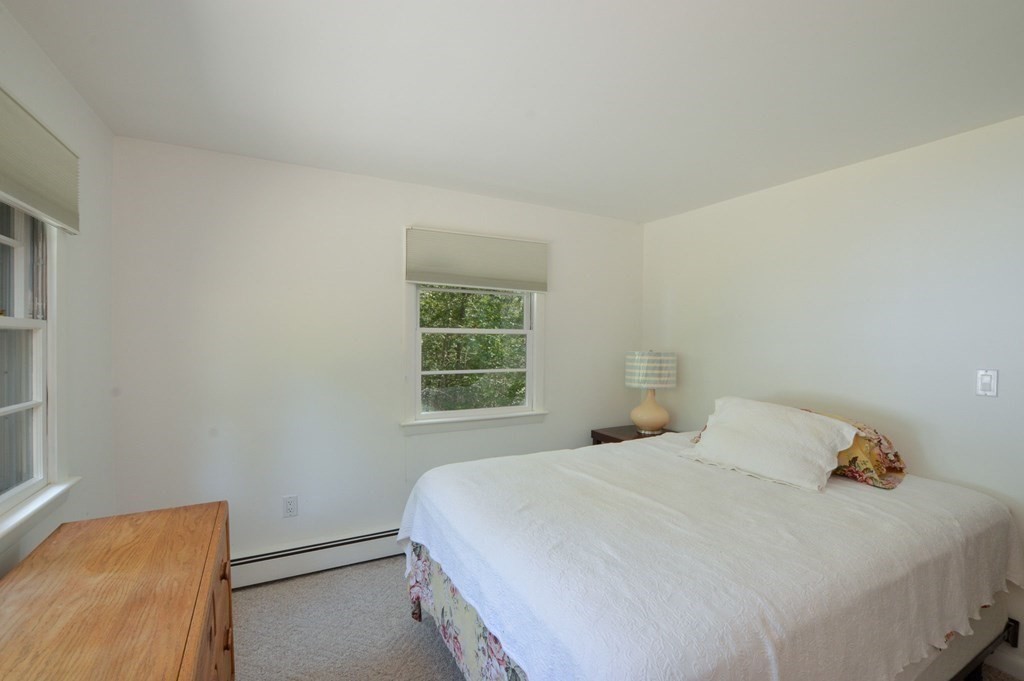 230 Pimlico Pond Road Mashpee, MA 02649 - Photo 27 of 35 a bedroom with a bed and a window