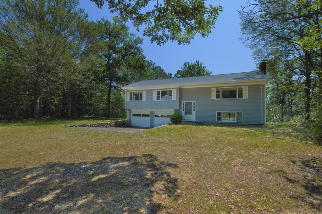 230 Pimlico Pond Road Mashpee, MA 02649 - Photo 3 of 35 a house view with a garden space