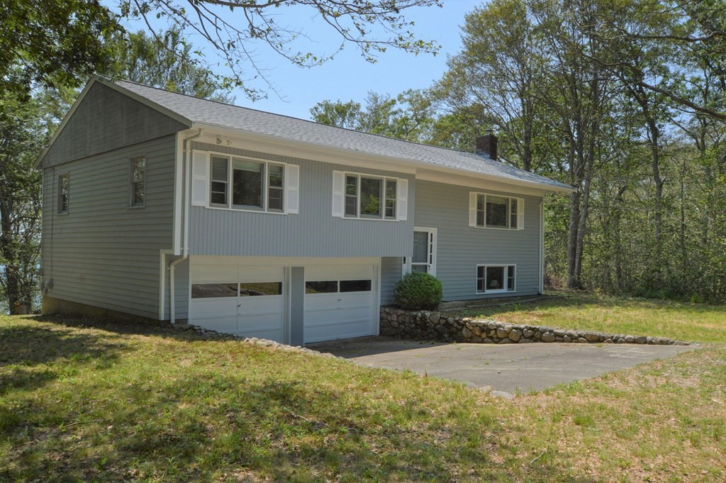 230 Pimlico Pond Road Mashpee, MA 02649 - Photo 34 of 35 a view of a house with a yard