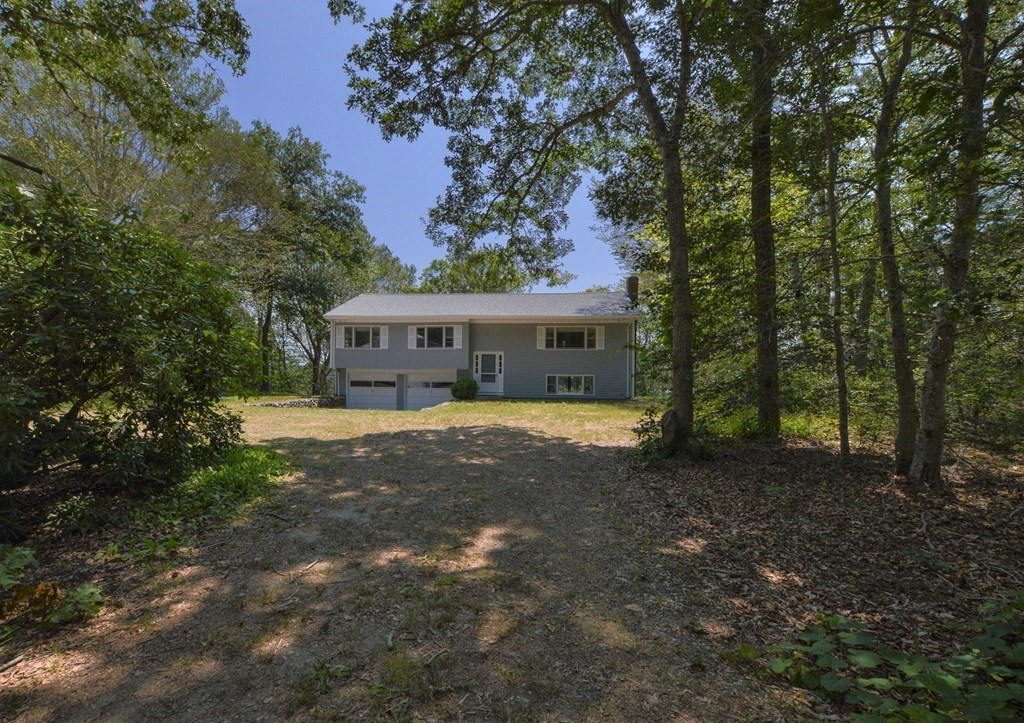 230 Pimlico Pond Road Mashpee, MA 02649 - Photo 4 of 35 a view of house with outdoor space and garden