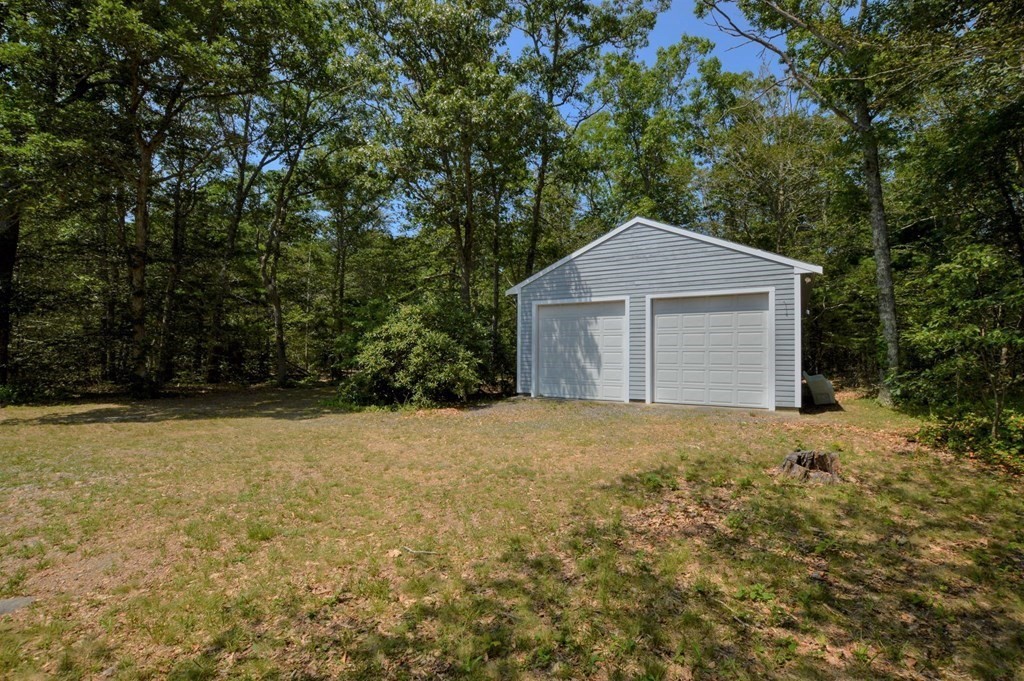 230 Pimlico Pond Road Mashpee, MA 02649 - Photo 6 of 35 a house with trees in front of it