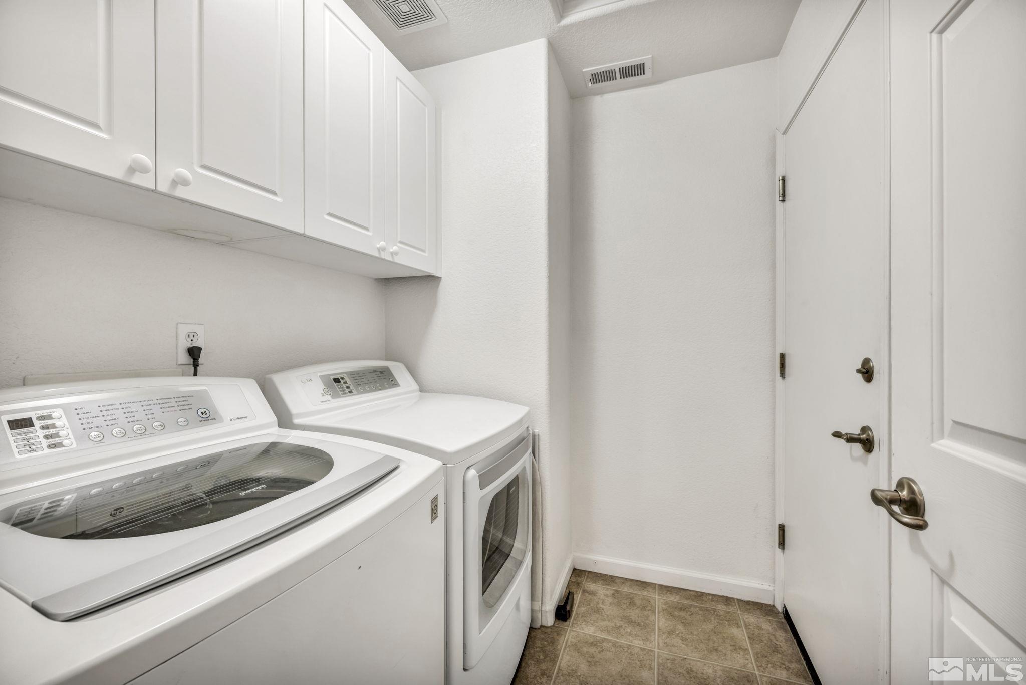 1770 Ornellaia Way Reno, NV 89521 - Photo 15 of 37 a utility room with dryer and washer