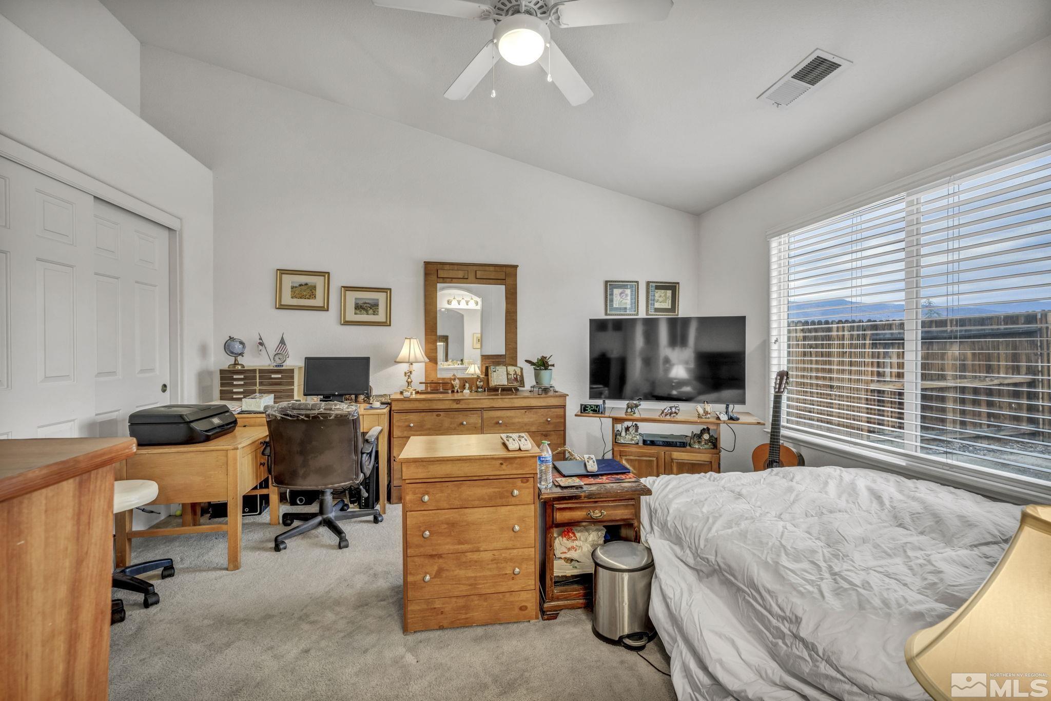 1770 Ornellaia Way Reno, NV 89521 - Photo 17 of 37 a living room with furniture and a flat screen tv