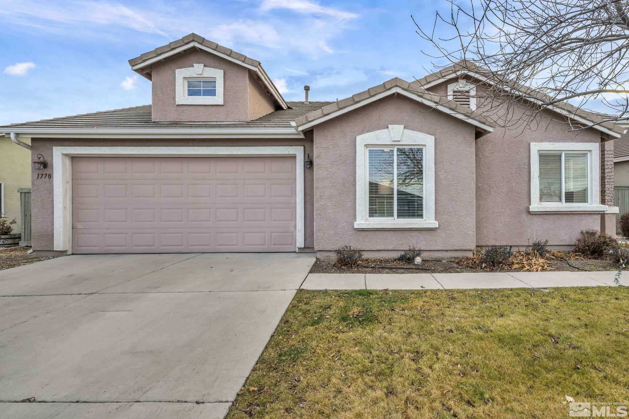 1770 Ornellaia Way Reno, NV 89521 - Photo 2 of 37 a front view of house with yard
