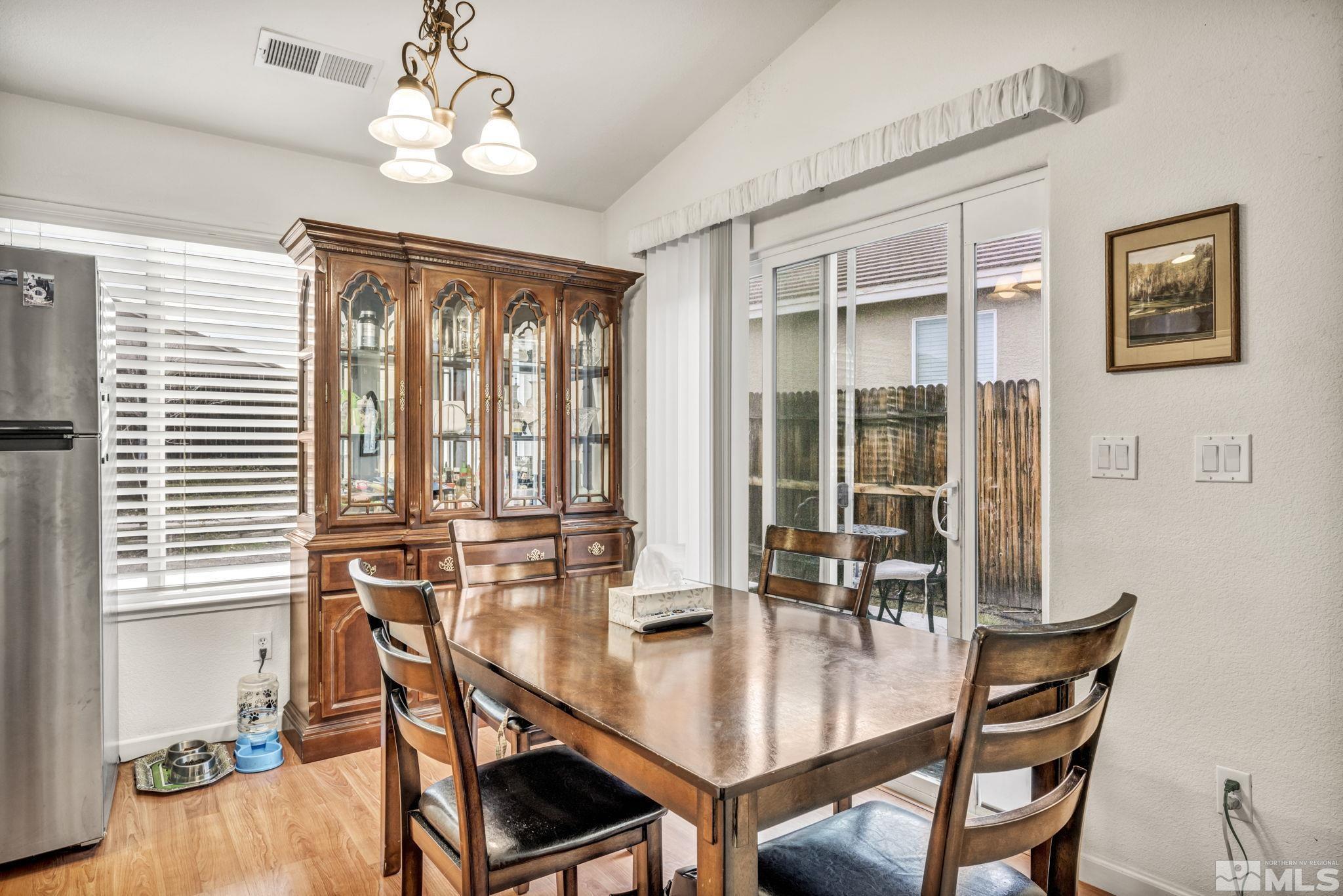 1770 Ornellaia Way Reno, NV 89521 - Photo 24 of 37 a dining room with furniture and window