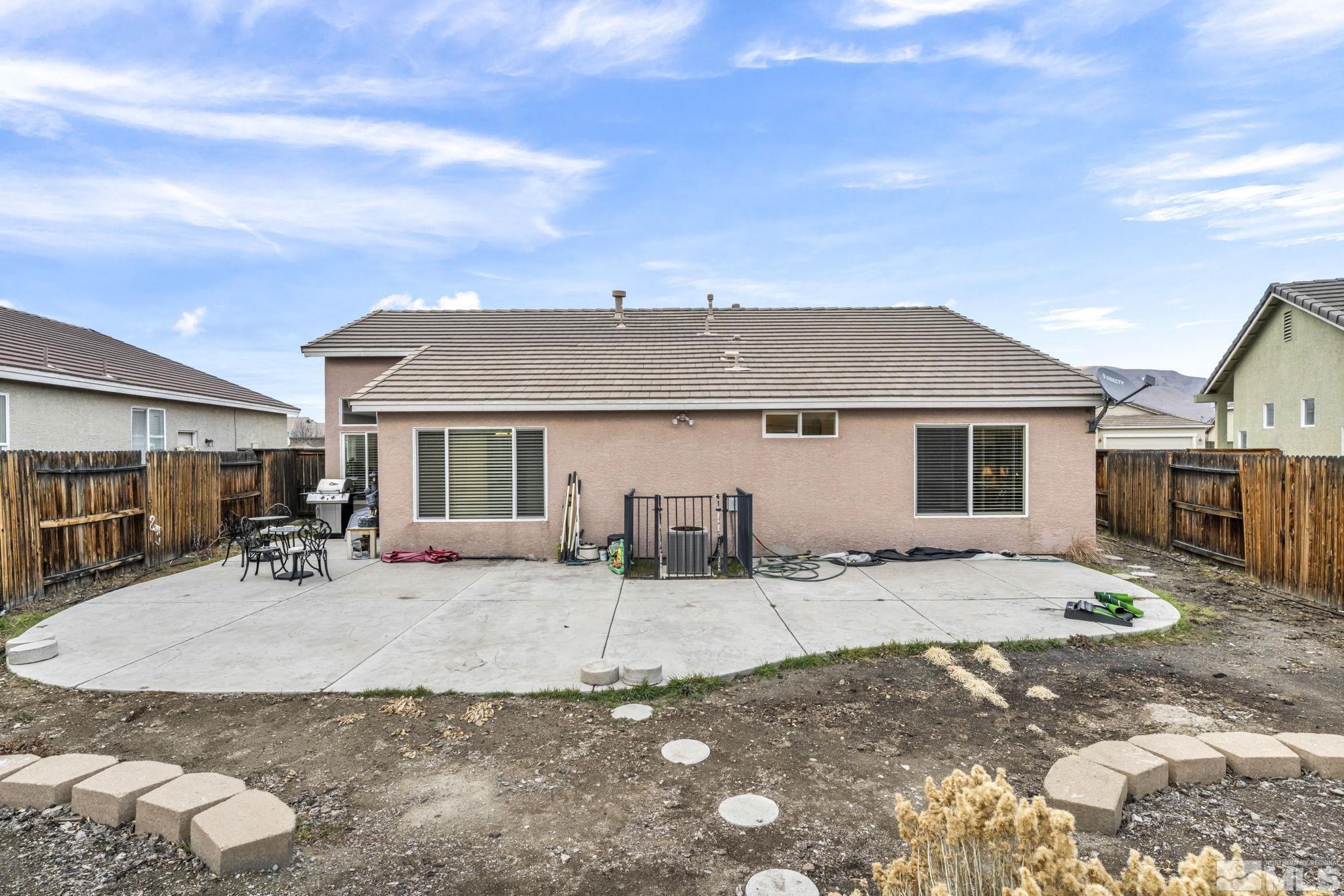 1770 Ornellaia Way Reno, NV 89521 - Photo 32 of 37 a view of a house with a patio