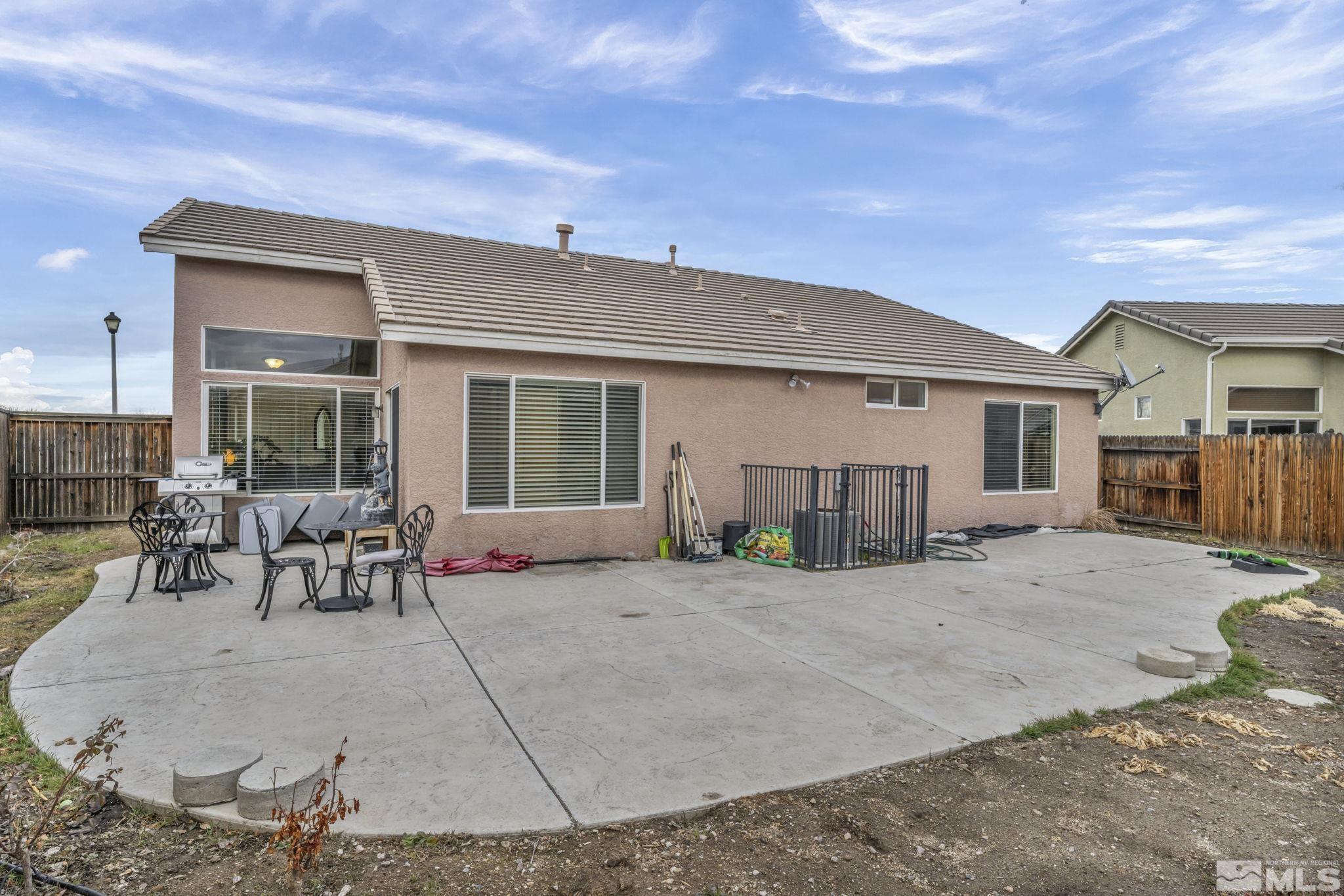 1770 Ornellaia Way Reno, NV 89521 - Photo 35 of 37 a view of a house with backyard and sitting area