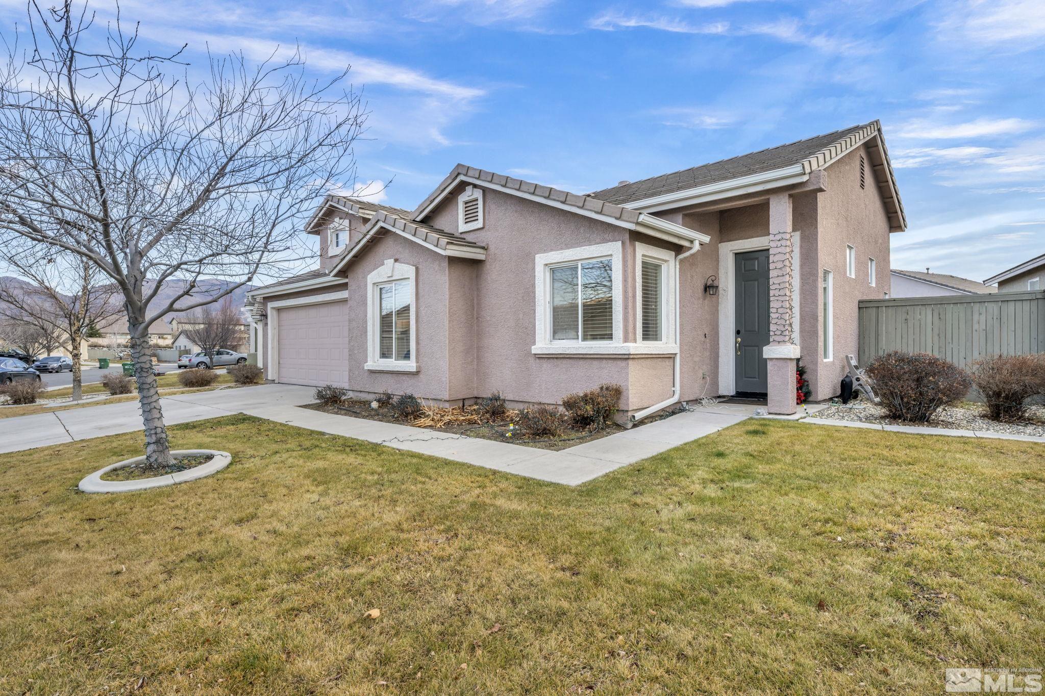 1770 Ornellaia Way Reno, NV 89521 - Photo 4 of 37 a front view of a house with a yard