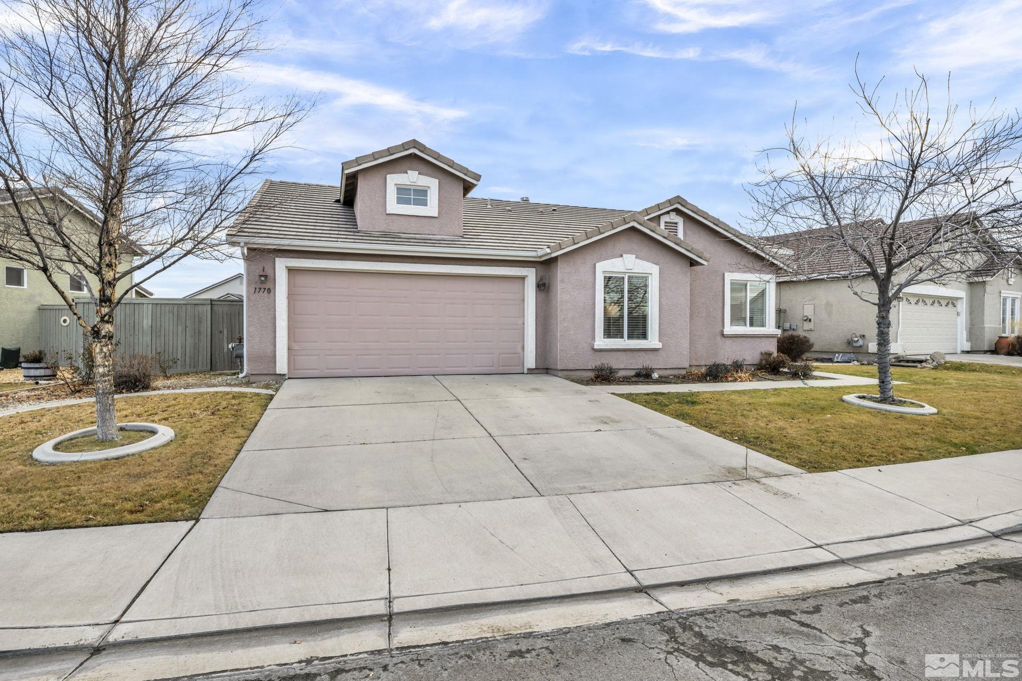 1770 Ornellaia Way Reno, NV 89521 - Photo 7 of 37 a front view of a house with yard