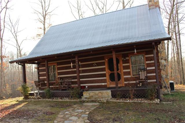 217 Amanda Road Dover, TN 37058 - Photo 1 of 20 Beautiful Log Home on 5+ Acres, nestled back in the woods.