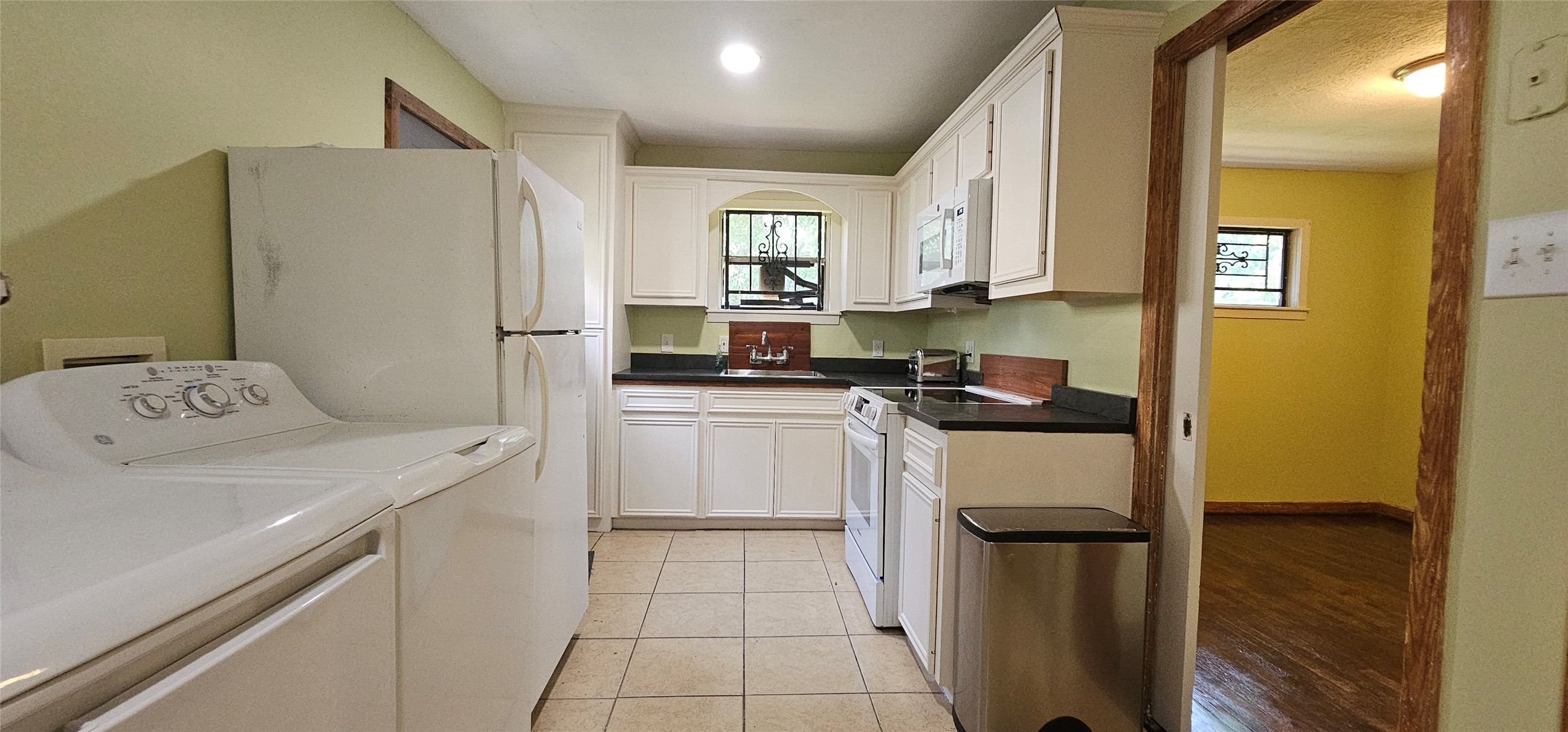 3610 Dennis Street Houston, TX 77004 - Photo 5 of 20 a kitchen with a refrigerator sink and stove