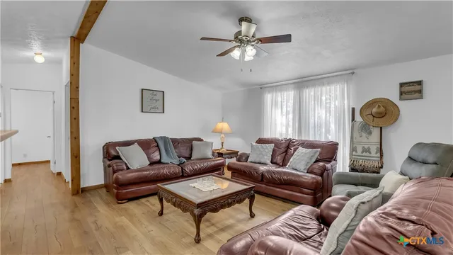 a kitchen with stainless steel appliances granite countertop a stove a sink dishwasher and a refrigerator
